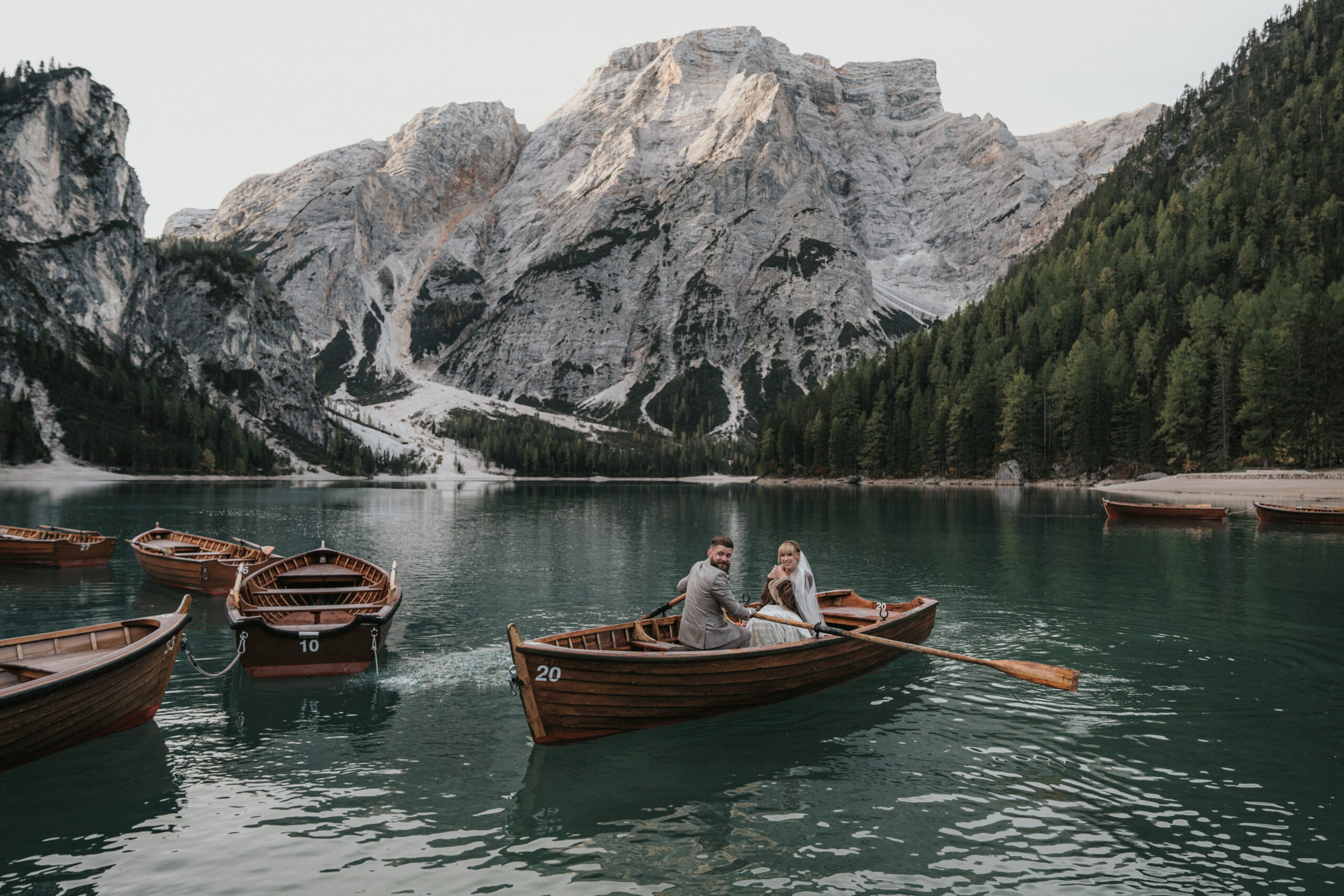 Groom Rowing Bride Back to Dock for Their Intimate Moment